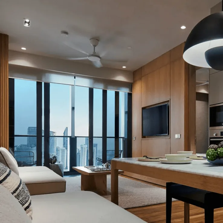 Living and dining area at The Conlay with floor to ceiling glazing